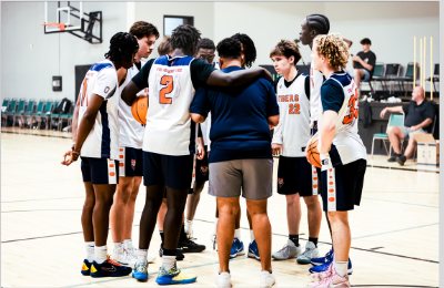 TAP team huddled together before a game