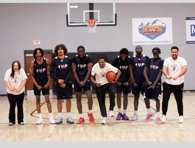 The Academy Phoenix team and coaching staff on the court